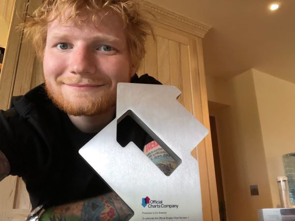 Ed Sheeran with his Official Number 1 Single Award for Take Me Back To London (credit: OfficialCharts.com)